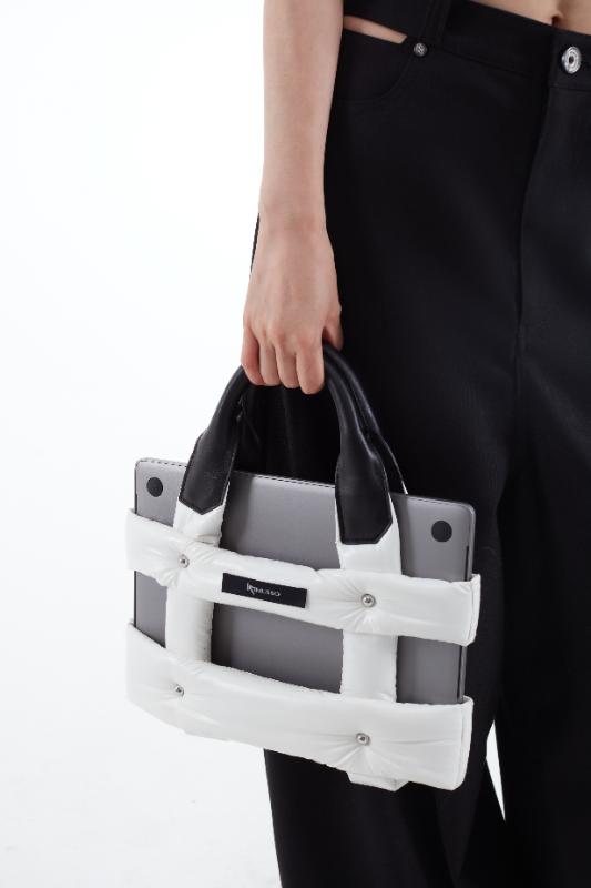 2025KIMUSSO International Fashion Week Silk wadded shock-proof computer bag