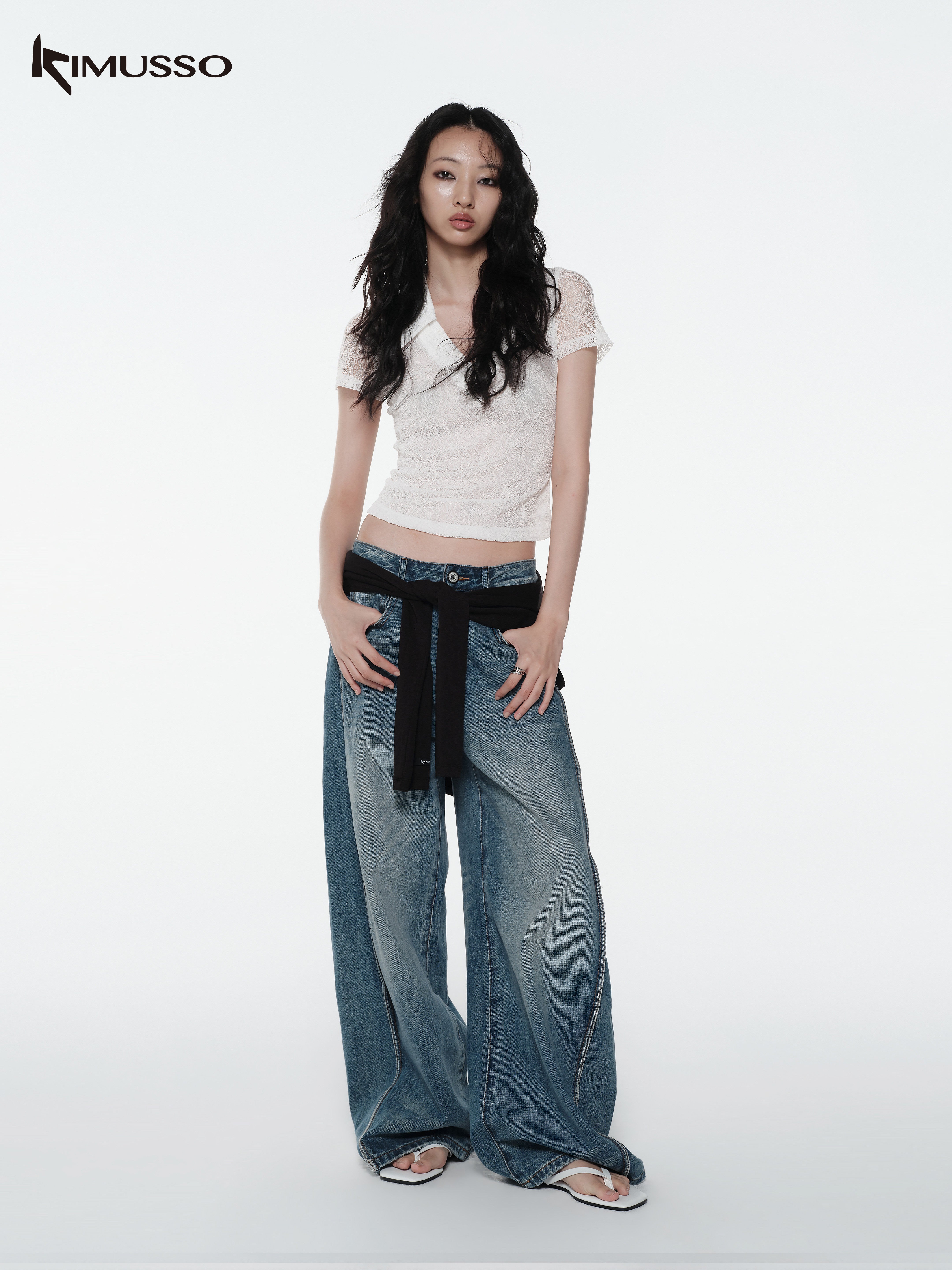 KIMUSSO “Sculptural Twist” Wide-Leg Denim Trousers