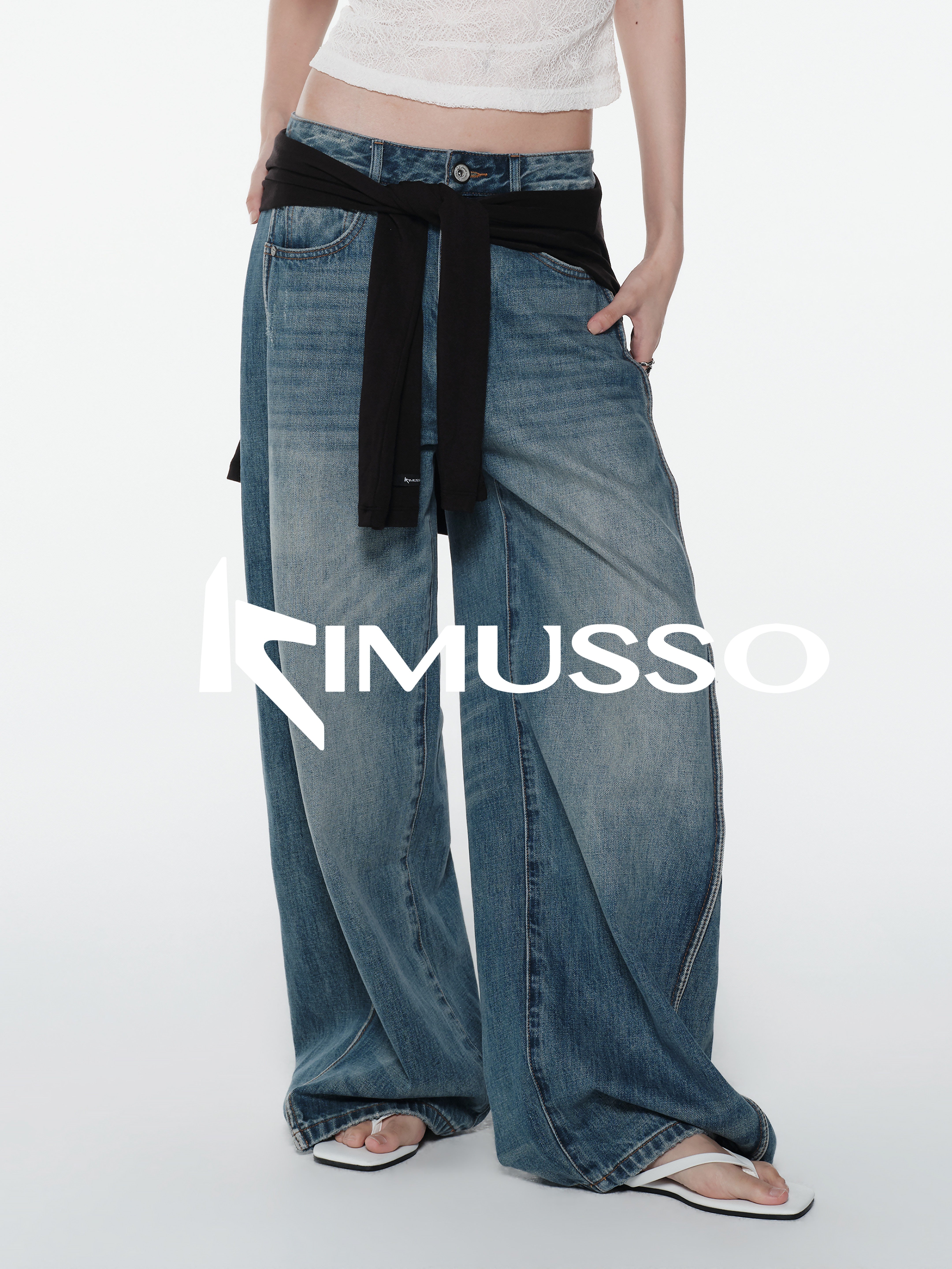 KIMUSSO “Sculptural Twist” Wide-Leg Denim Trousers
