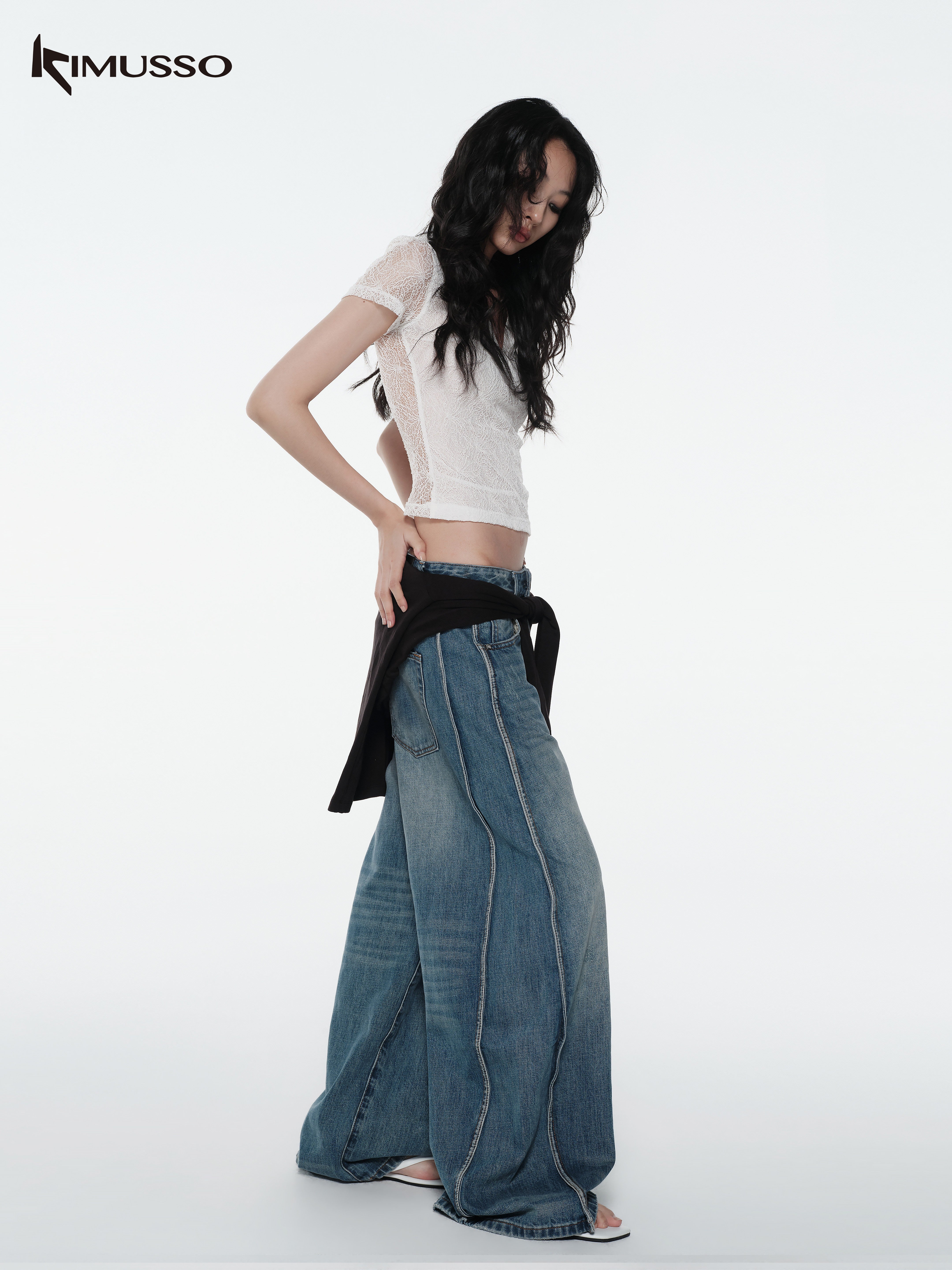 KIMUSSO “Sculptural Twist” Wide-Leg Denim Trousers